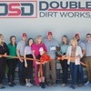 Lamar Democrat/Melody Metzger
A large crowd was on hand Wednesday, May 1, for the grand opening of Double S Dirt Works, Inc. as they showcased their newly constructed offices located at 1261 NW 40th Rd. in Liberal. The ribbon cutting was held outside on the patio. Pictured are Kim and Craig Spencer, along with other family members and employees.