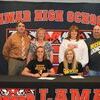 Lamar Democrat/Morgan Brisbin
A dual signing for rival schools was held Thursday afternoon, April 14, in the Lamar High School library, when Nicholas Ray signed to run for Pittsburg State University, while Hailey Landrum signed to play volleyball for Missouri Southern State University. Ray is the son of Alan and Susan Ray, and Landrum is the daughter of Keith and Ann Landrum.