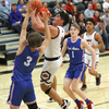 Photo by Terry Redman
Lamar junior guard No. 4 Alex Wilkerson is fouled as he drives in for a basket against East Newton. The Tigers will host Logan Rogersville on Tuesday evening in the Big 8 crossover game.