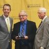 Photo courtesy University of Missouri Extension
Don Lucietta, honored in Columbia for service to the University of Missouri System. Left to right, MU Vice Chancellor Marshall Stewart, Lucietta, and son of Gordon Warren, after whom the award is named.