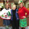 McFadden Land &amp; Title Co., Pahlow &amp; Pahlow, held its 16th annual holiday open house from 10 a.m. to 3 p.m. on Thursday, Dec. 14, at 127 W. 11th St., in Lamar. Decked out in holiday attire are, left to right, Liz Sumner, Nadine Mayfield and Cindy McFadden.