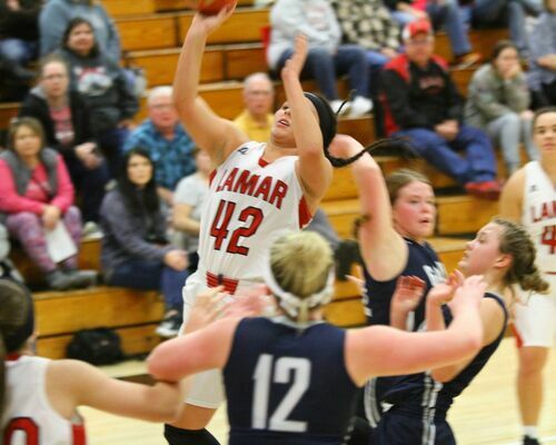 No. 42 Sierra White, sophomore, drives down the lane for a layup as the Lamar Lady Tigers pulled away for a double digit victory over Galena.