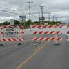 Lamar Democrat/Richard Cooper
Police erected barriers as Muddy Creek lapped close to Highway 160.