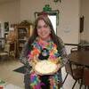 Photo courtesy of Willis Strong
Stormy Cuba, director of the senior center in Lamar, is shown holding a coconut crème pie that was given to her for her birthday by a woman that eats at the center often. Stormy’s birthday was Monday, March 19.