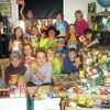 Third graders in Mrs. Harrison's class at Liberal Elementary headed up a canned food drive to be donated to help feed families during the holidays. The elementary donated a total of 1,111 items to the Good Samaritan, to help fill Christmas baskets. Each day students would collect, tally and chart the total for each class. Mrs. Troth's third grade won with 240 cans brought in.