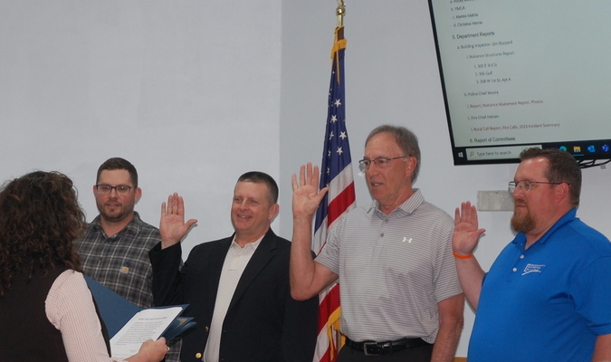 Lamar Democrat/Melody Metzger
Lamar City Clerk Felicia Costley swore in the newly elected aldermen at the April 15 meeting of the Lamar City Council. Pictured, left to right are Colton Higgins, Curt Roland, Mike Main and Logan Powell.
