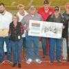 Lamar Democrat/Chris Morrow
The America’s Farmers Grow Rural Education Program, sponsored by the Monsanto Fund, awarded the Lamar R-1 School District with a $10,000 grant during halftime at the Friday night Lamar vs. Seneca football game. Many were on hand for the presentation.