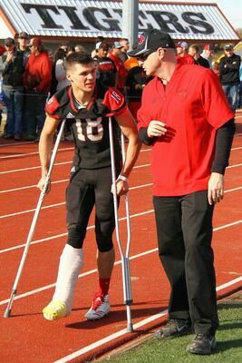 Lamar senior defensive back No. 18 Dylan Hill returns to the sideline in the second half after breaking his leg in first half action. The Tigers rallied late to defeat the Ava Bears 35-30.