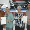 Accepting checks for the Liberal School District were Superintendent Bill Harvey, far right and School Counselor Shanda Shaw, second from left. Presenting the checks were Lamar Masonic Lodge Master Harry Charles, left and Mt. Hope Chapter, OES, Worthy Matron Judy Keener, third from left.