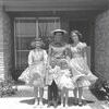 Pictured in front of their home in Richardson, Texas in 1960, prior to attending Easter Sunday services, were Cindy Tanner, Joanne Metzger and Candy Metzger, back row, and Martin (McCall) Metzger and Melody Metzger.