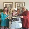 The big winner of the $500 king comforter bed set, given away at the Decorating Den reception held Friday, April 13, was lucky Betty Thieman. Betty is pictured with granddaughter Wacey and Jane Moyer, owner/interior designer, right, and Jen Hurt, interior designer, left. Decorating Den congratulates Thieman and thanks all who attended the reception and day of fun.