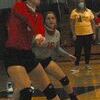 Lamar Democrat/Chris Morrow
Liberal senior Gracie Bott passes the ball to a teammate during the Bulldogs win at Thomas Jefferson last week. Also pictured is the team's libero Elizabeth Long.