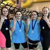 The CatTracks 13-14 girls dominated the relay competition at the 2017 Heartland Regional YMCA Swim Championships during the weekend of March 3-5. The quartet, known as the Fab Four, won the 200 yard freestyle relay, the 400 yard medley relay, the 200 yard medley relay and the 400 yard freestyle relay, while setting Regional records in each event. Pictured, left to right, are Meghan Watson, Mycah Reed, Kaitlyn Davis and Macy Bean.