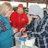 Photo courtesy of Willis Strong
Sisters Glenda Epple, left, and Maxine Rader, center, visit with Billy Strong at the April 10 10th Street Community Farmers' Market under Moore Pavilion in Lamar.