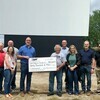 Lamar Bank &amp; Trust Co. employees were delighted recently to present Barco Drive-In manager Scott Kelley with a check for $20,000, to be used towards the new screen tower project.