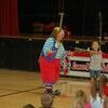 Lamar Democrat/Melissa Little
The circus is coming to town and as a promotion, Skeeter the clown visited area schools on Friday afternoon, Sept. 2, entertaining the children and producing lots of laughs. During one of the assemblies Skeeter had two children from each grade level balance a peacock feather on their finger and of course, the feather fell quickly. Skeeter taught them how to focus their eyes on the eye of the feather and to never look away. After that, they all balanced the feather. Pictured are Maylea Davey, a third grader in Mrs. Achey's class and to the left, Jace Talbott, a fourth grader in Mrs. O'Sullivan's class.