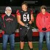 Photo courtesy of Terry Redman
Lamar’s final home game of the season was played last Friday night with the Tigers rolling East Newton 53-14. Senior players and parents were honored in a ceremony prior to the game. Shown here is No. 64 Rylan Wooldridge with his parents, Mike and Amber Wooldridge.