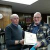 Rick Hornbeck, right, retired from the City of Lamar on January 13, after 28 years of service. He had served as the water plant supervisor. Lamar City Administrator Lynn Calton, left, presented Hornbeck with a certificate in recognition for his years of service.