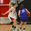 Photo courtesy of Terry Redman
No. 21 Taryn Torbeck defends against this Lady Indian in freshman action at Lamar High School.