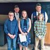 Patriot’s Pen winners with a theme of What Makes America Great were, front row, left to right, Thomas Hull, first place; Layla White, second place and Carson Sturgell, third place. Pictured with them are VFW Senior Vice-Commander Merdith Chapman, left and member Tom Reed, right.