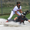 Photo by Terry Redman
Lamar senior Jaycee Doss slides under the tag of Aspen Lehman in softball action in Jasper. The Lady Tigers won 14-2.