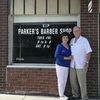 Lamar Democrat/Autumn Shelton
Stanley and his wife Henrietta stand in front of his barber shop.