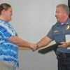 Lamar Democrat/Richard Cooper
Police Chief Ken Bergman presented a certificate of recognition to Anna Strong at the August 15 city council meeting for her quick call to the police that resulted in the solving of seven burglaries.