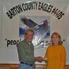 Lamar Democrat/Melody Metzger
With an emphasis on “People Helping People”, Barton County Eagles No. 4405 President Larry Spencer presented the lead afternoon teacher at Lamar Head Start, Jan Ridenour, with a check raised by the Eagles in the amount of $150. Funds are to be used towards necessary items needed by the school. The Barton County Eagles are also instrumental in raising scholarship funds, holding Christmas celebrations for needy children, sponsoring an Easter egg hunt, supporting little league sports teams, and helping those in need.