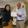 Ruth Morales Metcalf, a Liberal High School graduate, was presented a $2000 scholarship by local Shelter Insurance agent Bruce Belline.