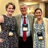 Brandy Lawrence (left) and Liza Marhanka (right) network with Dr. John Hamil (center), retired veterinarian and CVHS alumnus.