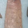 A five inch pink projectile point was found in a remote Arkansas cave, with the very tip sticking up out of the floor.